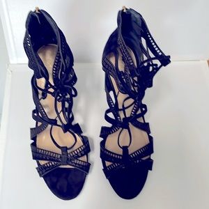 Vince Camuto 3in. Heel, lace up very sexy with the right outfit. Leather upper